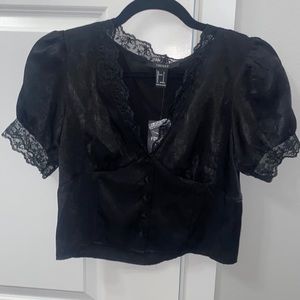 Women’s Black Silky Top. Size Small, New with tag.